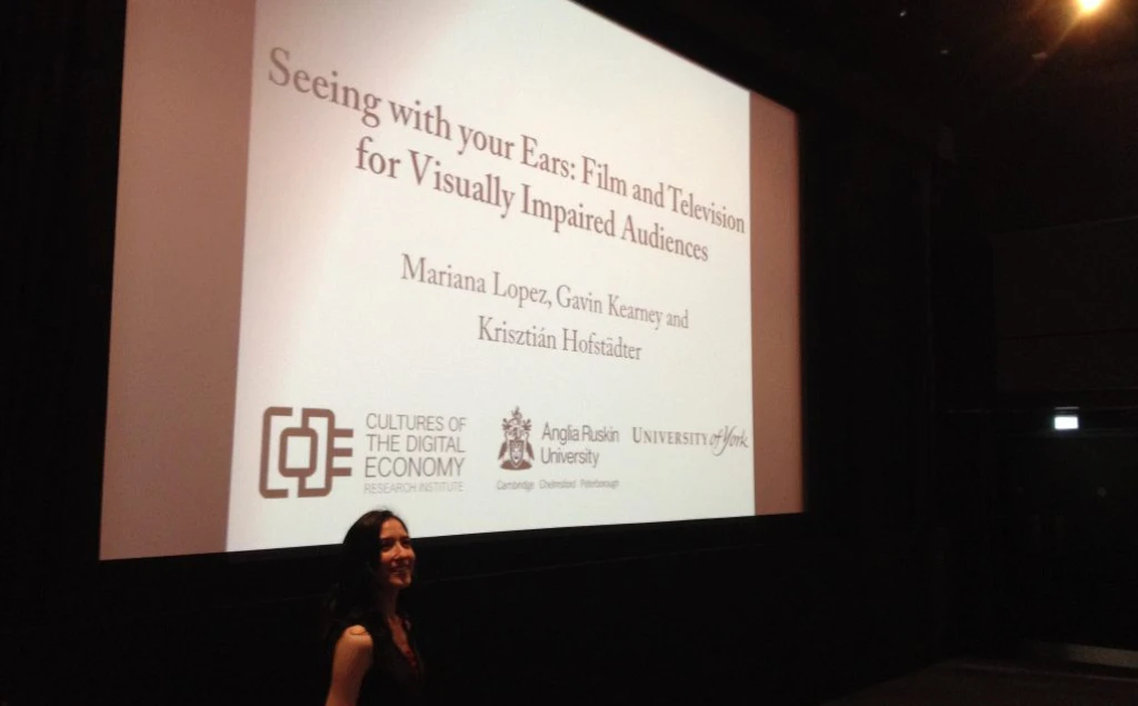 A photo of Mariana presenting.