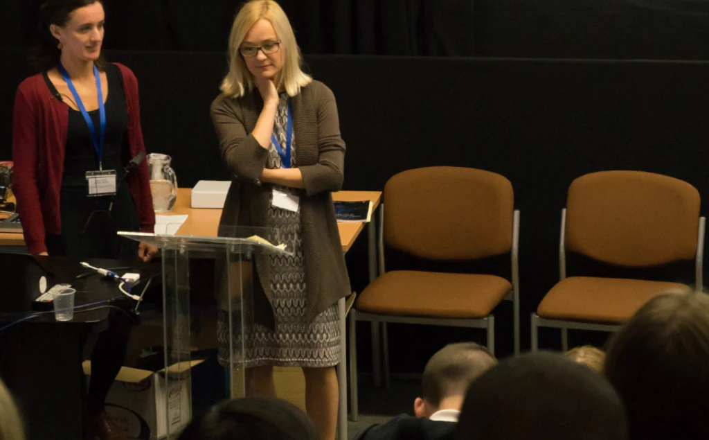 A photo of Olivia and Agnieszka presenting at our conference.