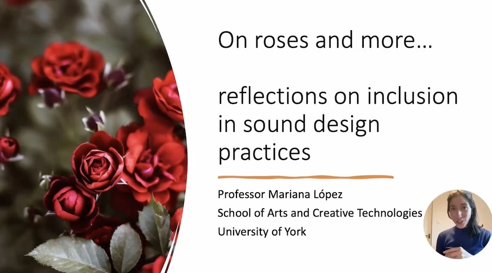 ‘The photo of the event with people in the panel and the audience.’