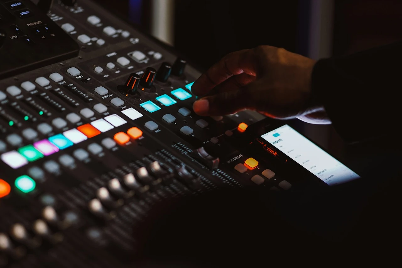 Photo of mixer with knobs and buttons.