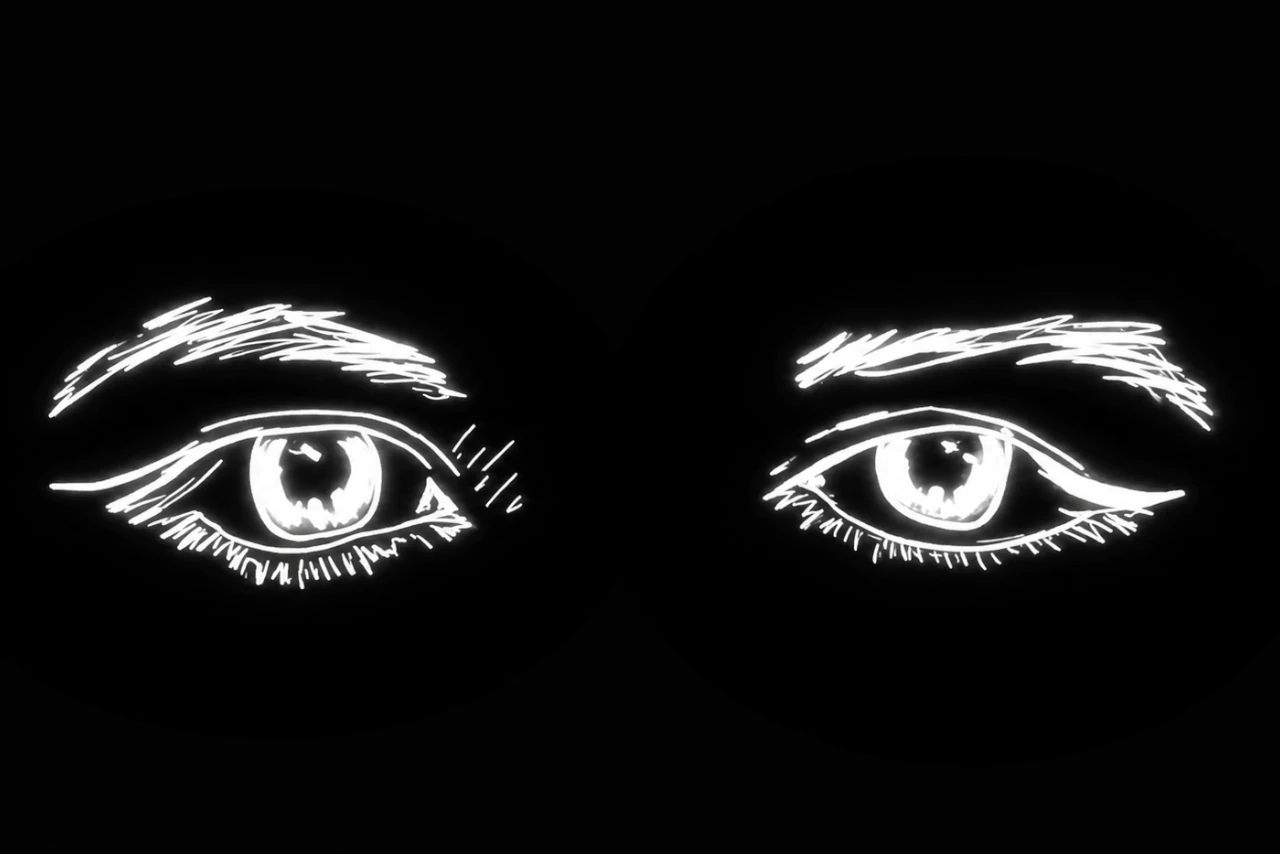 MA drawing of eyes in white on a black background.